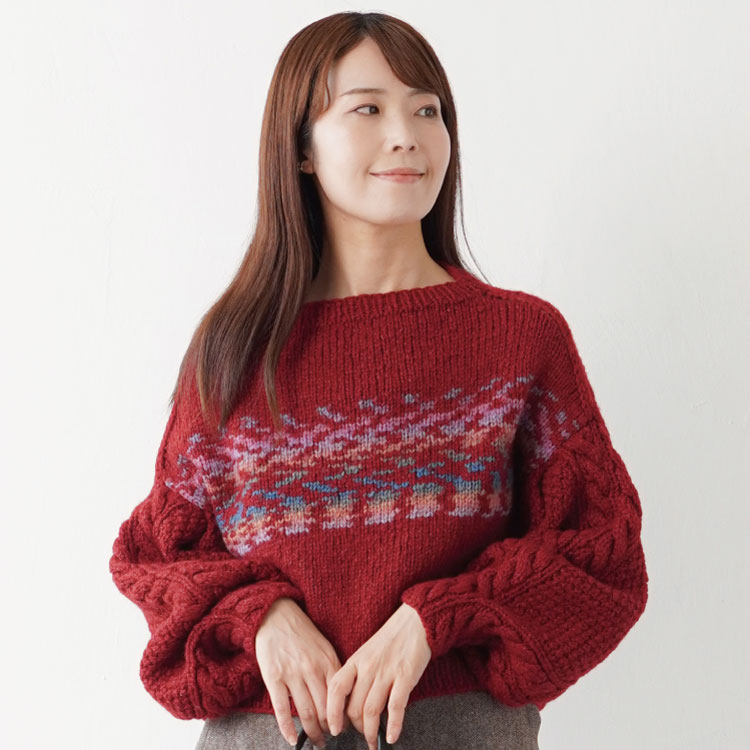 ケーブル柄のふんわり袖セーター