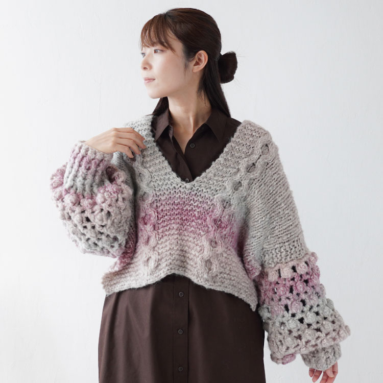 かぎ針袖の付いたケーブル柄ベスト